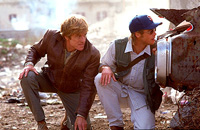 Robert Redford (left) and Brad Pitt are CIA agents in <i>Spy Game</i>. Image