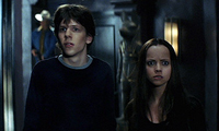 Jesse Eisenberg (left) and Christina Ricci face off with werewolves in <i>Cursed</i>. Image