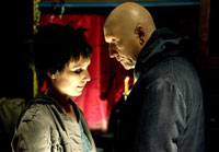 Shawnee Smith (left) and Tobin Bell return for a third turn in <i>Saw III</i>. Image