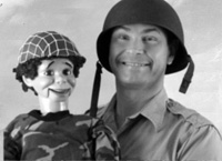 Terry Jernigan (right) and his dummy, Delbert in <i>Forgotten Stars</i>. Image