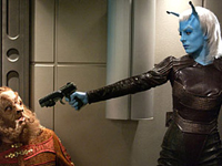 An Andorian holds a Tellarites prisoner in <i>Enterprise</i>. Image