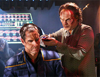 The captain (Scott Bakula) and Dr. Phlox (John Billingsley) aide the Klingons on <i>Enterprise</i>. Image