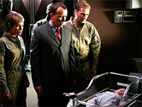 Peter Weller (c.) guest stars on <i>Enterprise</i> with regulars Connor Trinneer (r.) and Jolene Blalock. Image