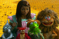 Ashanti accompanies (l. to r.) Gonzo, Pepe, Kermit and Fozzy down the yellow-brick road in 'Muppets’ Wizard of Oz'