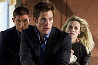 Tom Hardy (l.), Chris Pine, and Reese Witherspoon co-star in 'This Means War'