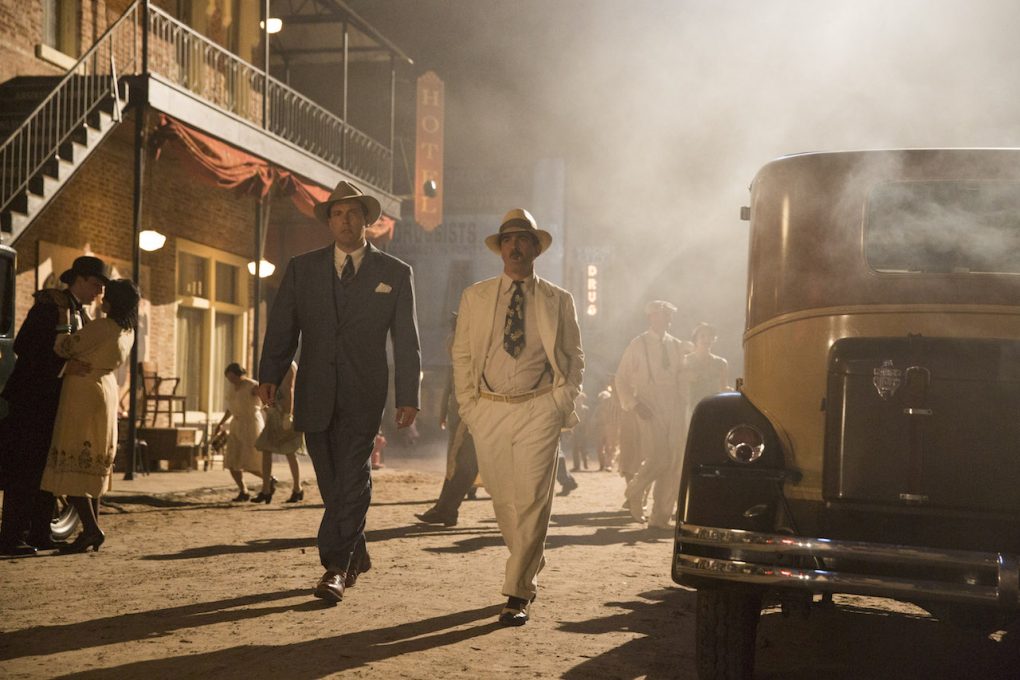 Ben Affleck and Chris Messina walk through Ybor City in 'Live by Night'
