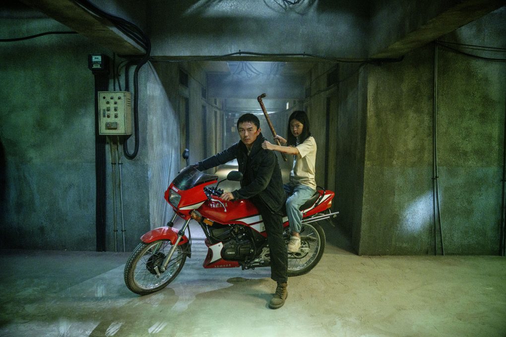 Xie Miao as Wang Wei and Yang Enyou as Rainy in "The Furious." (Norachai Kajchapanont / Lionsgate)